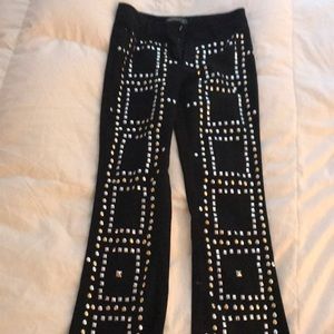Mode black pants with gold and silver studs